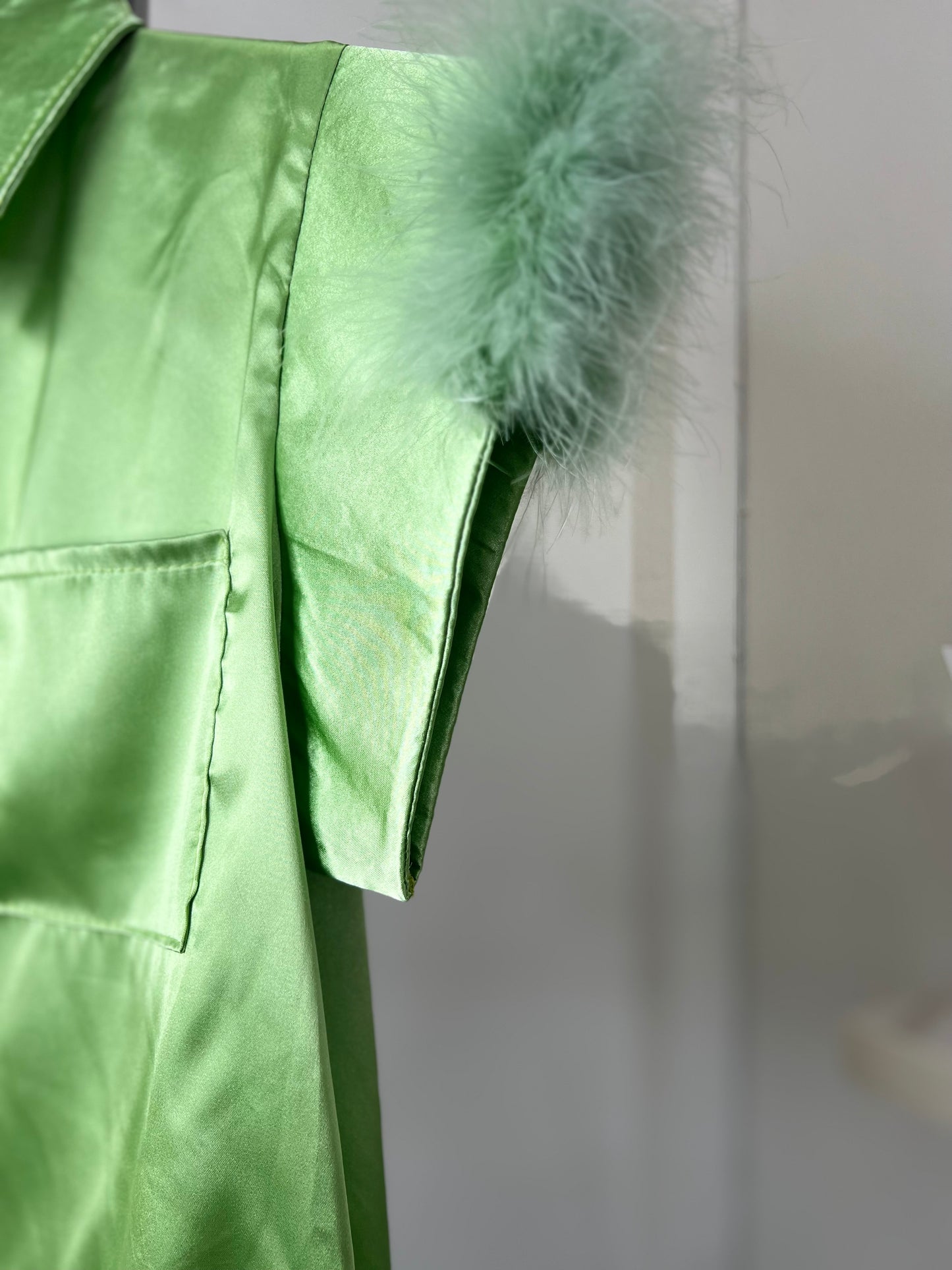 Blusa plumas verde