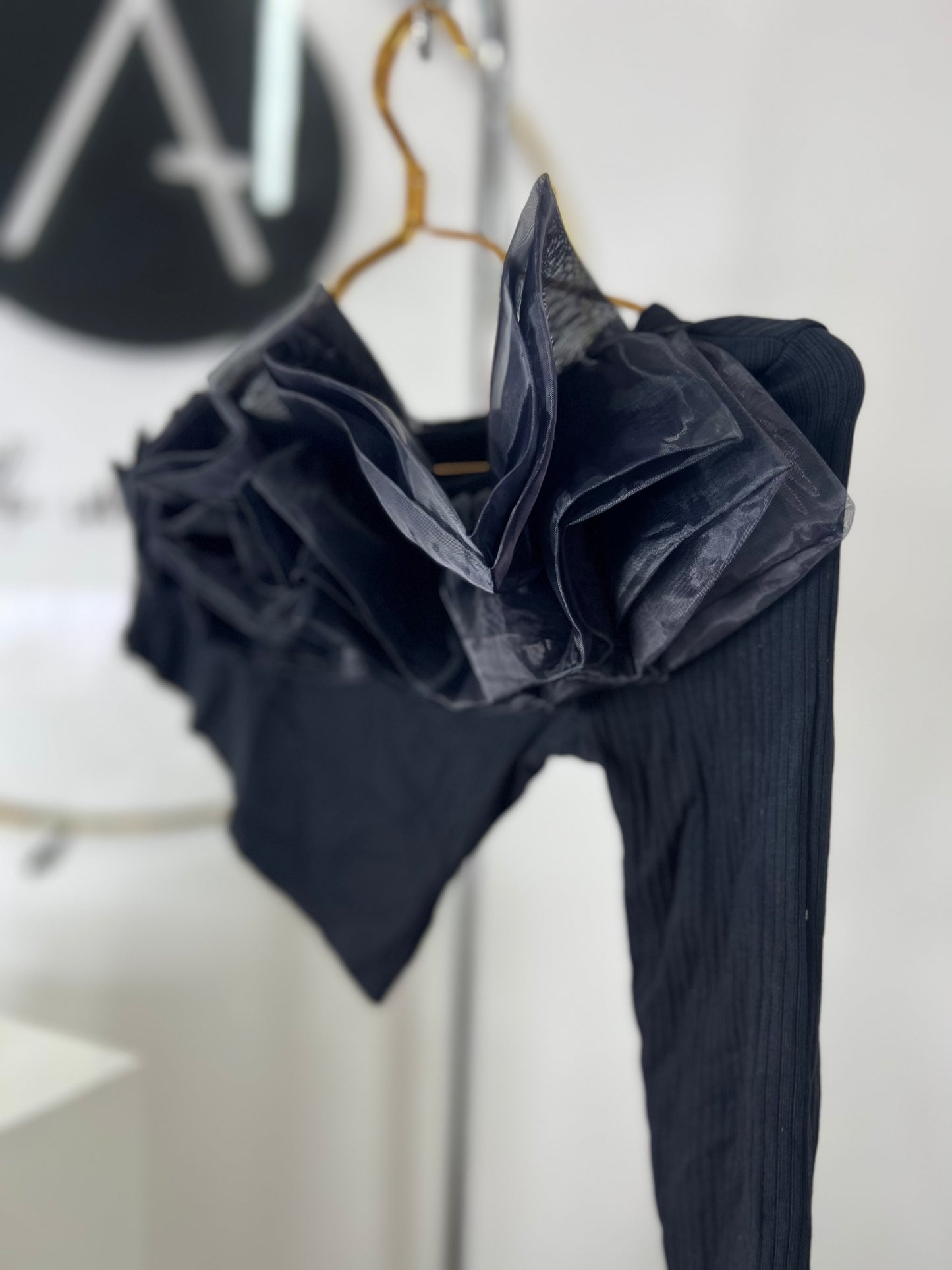 Blusa asimétrica negra